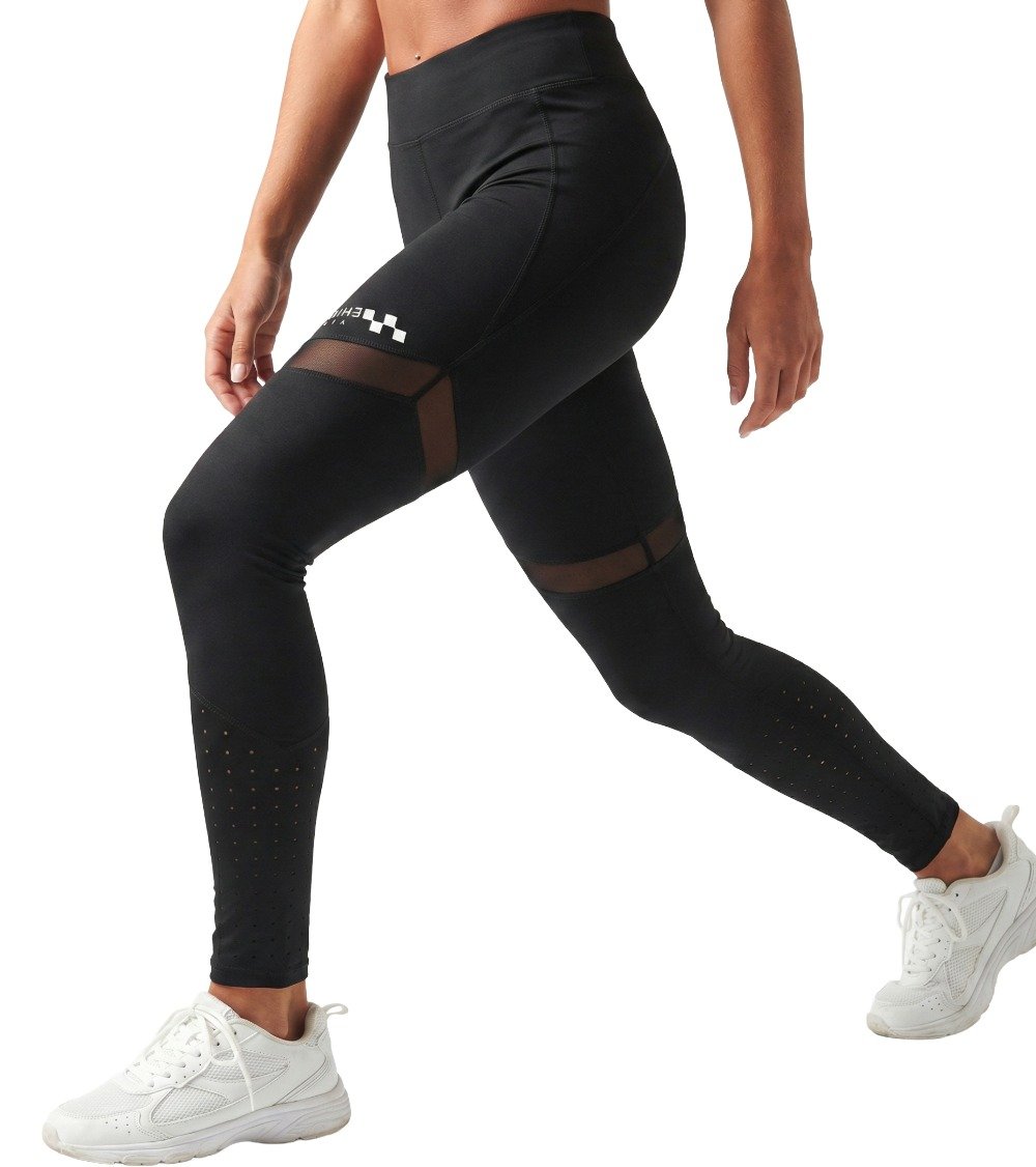 Side view of women's black Monochrome Leggings featuring mesh thigh panels, laser cut calves, and checkered logo detail.